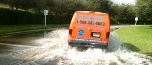 Water Damage Eagle Mountain Van Driving Down Flooded Street