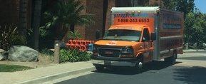 Water Damage Restoration Truck At Commercial Job Location